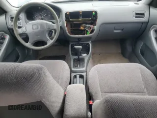 1997 Honda Civic LX z VIN 2HGEJ6676VH507855, wystawiony jako Copart lot #56684455 z przebiegiem 185 498 mil mil oraz Szkoda całkowita • Salvage title. Historia ofert i sprzedaży dostępna na DreamBid. Obrazek 8.