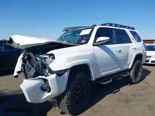 2019 Toyota 4Runner SR5 with VIN JTEBU5JR4K5659014, listed as a IAAI auction lot 41369141 with 90,376 mi miles. Bid and sale history available at carsss.com. Image 2.