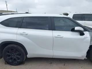 2023 Toyota Highlander L with VIN 5TDKDRAH9PS039652, listed as a IAAI auction lot 41948320 with 127,310 mi miles and . Bid and sale history available at DreamBid. Image 13.