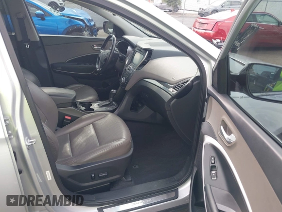 2014 Hyundai Santa Fe с VIN 5XYZU3LB5EG184685, выставлен на аукционе IAAI как лот 42407330 с пробегом 125 759 миль миль и . История ставок и продаж доступна на DreamBid. Изображение 5.