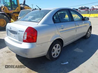 2007 Hyundai Accent GLS with VIN KMHCN46C57U087156, listed as a IAAI auction lot 42151298 with 81,588 mi miles. Bid and sale history available at carsss.com. Image 4.