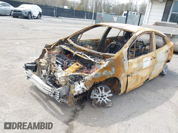 2021 Toyota Prius LE with VIN JTDKAMFPXM3180612, listed as a IAAI auction lot 39151391 with Not Provided miles and . Bid and sale history available at DreamBid. Image 2.