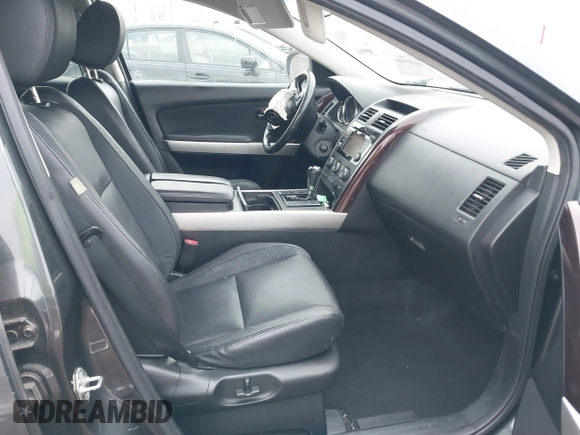 2015 Mazda CX-9 Grand Touring with VIN JM3TB2DAXF0447537, listed as a IAAI auction lot 41191694 with 157,113 mi miles. Bid and sale history available at carsss.com. Image 5.