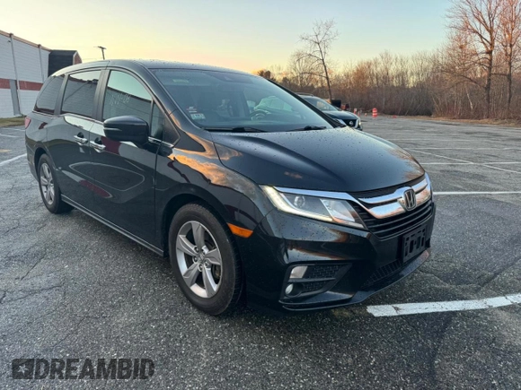 2019 Honda Odyssey EX-L z VIN 5FNRL6H78KB125979, wystawiony jako Copart lot #87329574 z przebiegiem 198 421 mil mil oraz Czysty tytuł • Clean title. Historia ofert i sprzedaży dostępna na DreamBid. Obrazek 1.