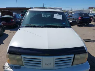 2000 Oldsmobile Bravada with VIN 1GHDT13WXY2284231, listed as a IAAI auction lot 41751228 with 151,477 mi miles. Bid and sale history available at carsss.com. Image 12.
