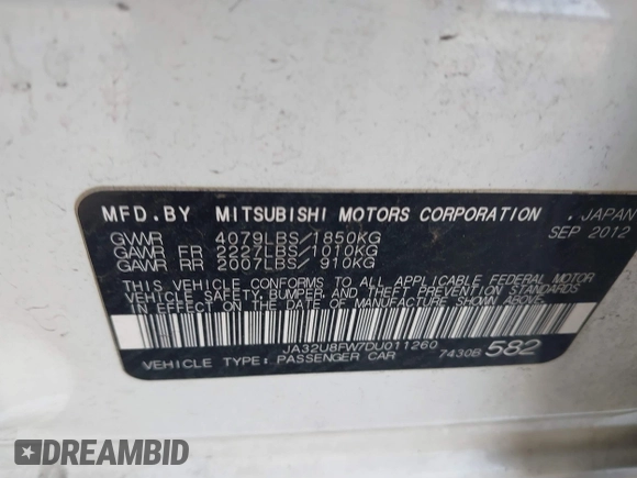 2013 Mitsubishi Lancer GT with VIN JA32U8FW7DU011260, listed as a IAAI auction lot 41233707 with 165,183 mi miles. Bid and sale history available at carsss.com. Image 9.