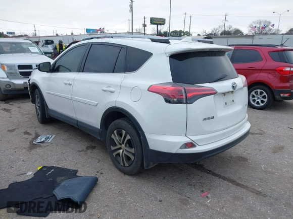 2017 Toyota RAV4 LE with VIN JTMZFREV1HJ103223, listed as a IAAI auction lot 41571466 with 96,860 mi miles and . Bid and sale history available at carsss.com. Image 3.
