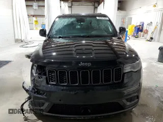 2018 Jeep Grand Cherokee Overland with VIN 1C4RJFCG1JC287784, listed as a Copart auction lot 50391255 with 105,981 mi miles and Salvage title. Bid and sale history available at DreamBid. Image 5.