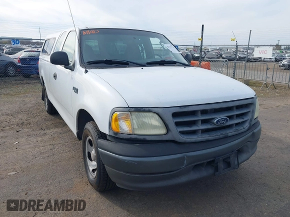 2002 Ford F-150 XL with VIN 1FTRX17222NB82564, listed as a IAAI auction lot 41701719 with 1 mi miles. Bid and sale history available at carsss.com. Image 1.
