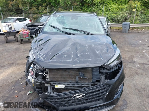 2021 Hyundai Tucson Ultimate with VIN KM8J3CAL2MU320419, listed as a IAAI auction lot 42116859 with 34,172 mi miles and . Bid and sale history available at DreamBid. Image 6.