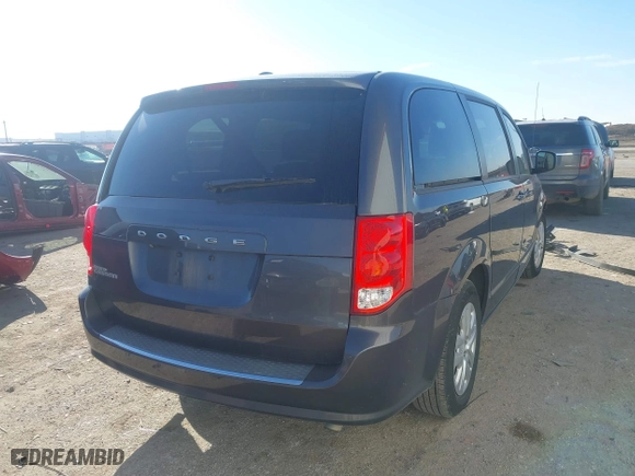 2018 Dodge Grand Caravan SE with VIN 2C4RDGBG3JR348560, listed as a IAAI auction lot 41657312 with 135,007 mi miles. Bid and sale history available at carsss.com. Image 4.