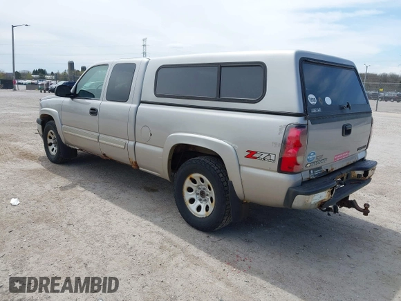 2005 Chevrolet Silverado 1500 LS with VIN 1GCEK19T65Z194720, listed as a IAAI auction lot 42157104 with 156,376 mi miles. Bid and sale history available at carsss.com. Image 3.