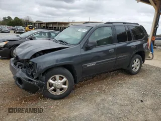 2004 GMC Envoy SLE with VIN 1GKDS13SX42303266, listed as a Copart auction lot 50000155 with 0 mi miles and Salvage Title. Bid and sale history available at carsss.com. Image 1.