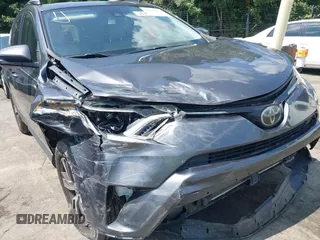 2018 Toyota RAV4 XLE with VIN JTMWFREV9JJ201845, listed as a IAAI auction lot 42442303 with 111,177 mi miles and . Bid and sale history available at DreamBid. Image 6.