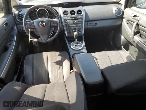 2012 Mazda CX-7 i SV z VIN JM3ER2AM2C0412683, wystawiony jako Copart lot #53774075 z przebiegiem 196 344 mil mil oraz Czysty tytuł • Clean title. Historia ofert i sprzedaży dostępna na DreamBid. Obrazek 8.
