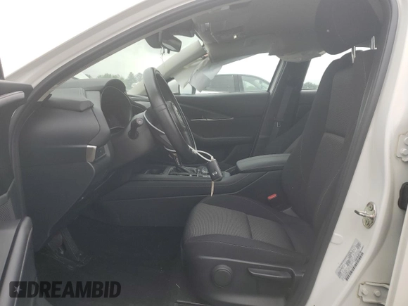 2023 Mazda CX-30 S with VIN 3MVDMBAM8PM557537, listed as a Copart auction lot 61154835 with 23,450 mi miles and Salvage title. Bid and sale history available at DreamBid. Image 7.