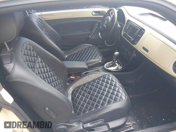 2019 Volkswagen Beetle S with VIN 3VWFD7AT2KM700941, listed as a IAAI auction lot 42474867 with 43,891 mi miles and . Bid and sale history available at DreamBid. Image 5.