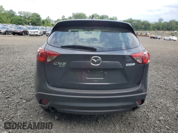 2015 Mazda CX-5 Sport with VIN JM3KE4BYXF0511249, listed as a Copart auction lot 63310695 with 208,615 mi miles and Salvage title. Bid and sale history available at DreamBid. Image 6.