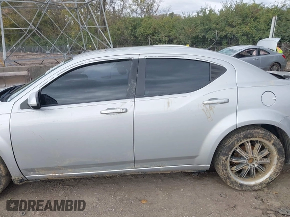 2012 Dodge Avenger SXT with VIN 1C3CDZCB8CN161680, listed as a IAAI auction lot 40581080 with Not Provided miles and . Bid and sale history available at DreamBid. Image 14.