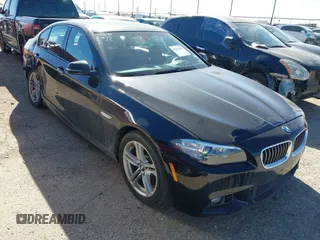 2016 BMW 5 Series 528i xDrive with VIN WBA5A7C56GG145318, listed as a IAAI auction lot 41414556 with 122,879 mi miles. Bid and sale history available at carsss.com. Image 1.