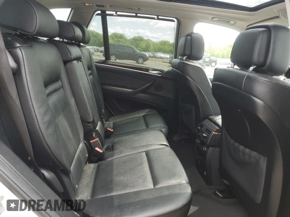 2012 BMW X5 35i with VIN 5UXZV4C54CL763857, listed as a Copart auction lot 57943195 with 143,522 mi miles and Salvage title. Bid and sale history available at DreamBid. Image 11.