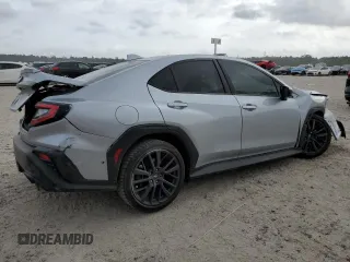 2024 Subaru WRX Premium with VIN JF1VBAH64R9808221, listed as a Copart auction lot 54990545 with 105,565 mi miles and Salvage title. Bid and sale history available at DreamBid. Image 3.