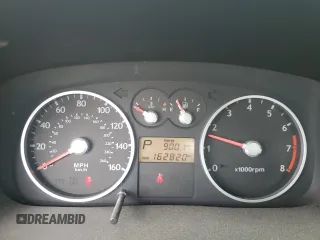 2003 Hyundai Tiburon z VIN KMHHM65D43U017995, wystawiony jako Copart lot #56498665 z przebiegiem 162 820 mil mil oraz Szkoda całkowita • Salvage title. Historia ofert i sprzedaży dostępna na DreamBid. Obrazek 9.