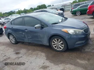 2014 Kia Forte LX with VIN KNAFX4A62E5221011, listed as a IAAI auction lot 42063598 with 187,649 mi miles. Bid and sale history available at carsss.com. Image 1.