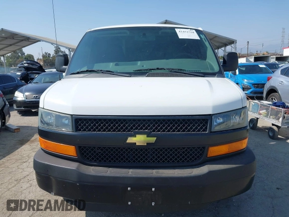 2013 Chevrolet Express Cargo with VIN 1GCWGFCB8D1902532, listed as a IAAI auction lot 42452764 with 95,113 mi miles and . Bid and sale history available at DreamBid. Image 12.