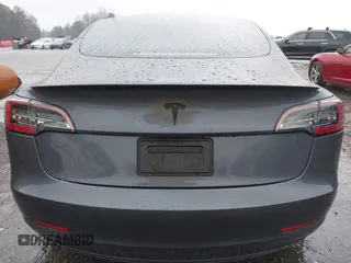2023 Tesla Model 3 z VIN 5YJ3E1EA3PF579776, wystawiony jako IAAI lot #41537794 z przebiegiem Nie podano mil oraz . Historia ofert i sprzedaży dostępna na DreamBid. Obrazek 16.