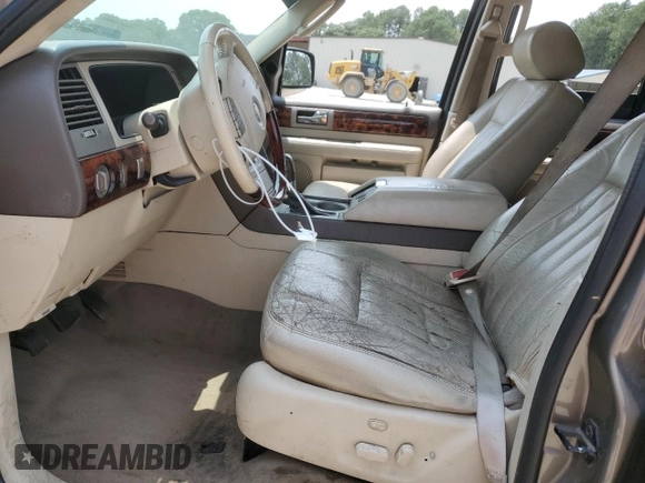 2004 Lincoln Navigator Luxury with VIN 5LMFU28R74LJ09128, listed as a Copart auction lot 59023625 with 181,658 mi miles and Salvage title. Bid and sale history available at DreamBid. Image 7.