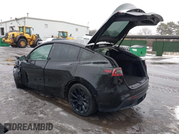 2023 Tesla Model Y Long Range with VIN 7SAYGDEE8PA183301, listed as a IAAI auction lot 41498769 with 82,893 mi miles and . Bid and sale history available at carsss.com. Image 3.