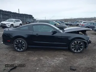 2012 Ford Mustang Premium with VIN 1ZVBP8AM7C5249954, listed as a IAAI auction lot 41881033 with 119,887 mi miles and . Bid and sale history available at DreamBid. Image 14.