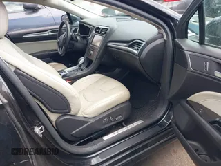 2015 Ford Fusion Titanium with VIN 3FA6P0D99FR300200, listed as a IAAI auction lot 42037306 with 232,095 mi miles. Bid and sale history available at carsss.com. Image 5.