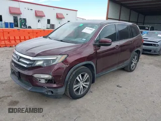 2016 Honda Pilot EX-L with VIN 5FNYF5H58GB026209, listed as a IAAI auction lot 41333088 with 129,484 mi miles and . Bid and sale history available at DreamBid. Image 2.