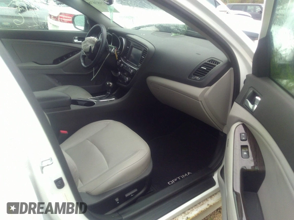 2015 Kia Optima EX with VIN 5XXGN4A71FG493648, listed as a IAAI auction lot 32483878 with Not provided miles and . Bid and sale history available at DreamBid. Image 5.