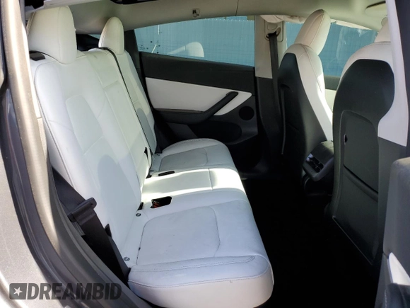 2022 Tesla Model Y Performance z VIN 7SAYGDEF1NF405329, wystawiony jako Copart lot #57249195 z przebiegiem 62 423 mil mil oraz Szkoda całkowita • Salvage title. Historia ofert i sprzedaży dostępna na DreamBid. Obrazek 11.