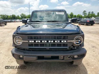 2023 Ford Bronco z VIN 1FMDE5BH0PLB83665, wystawiony jako Copart lot #60420145 z przebiegiem 16 678 mil mil oraz Czysty tytuł • Clean title. Historia ofert i sprzedaży dostępna na DreamBid. Obrazek 5.