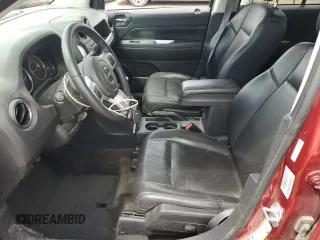 2016 Jeep Compass High Altitude z VIN 1C4NJDEB0GD709535, wystawiony jako Copart lot #61741985 z przebiegiem 80 924 mil mil oraz Szkoda całkowita • Salvage title. Historia ofert i sprzedaży dostępna na DreamBid. Obrazek 7.