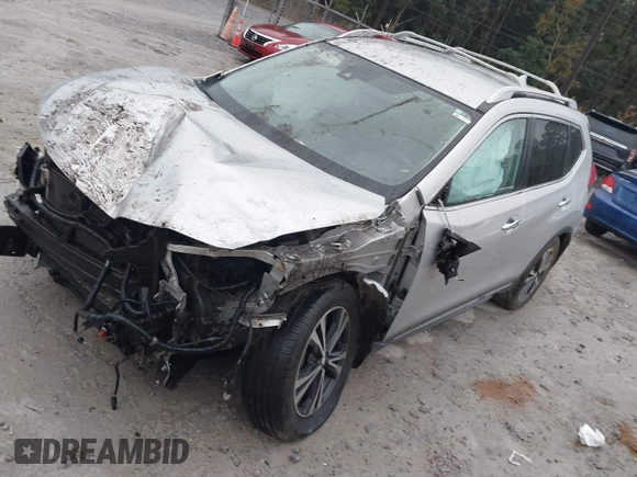 2017 Nissan Rogue SV with VIN JN8AT2MT7HW143178, listed as a IAAI auction lot 41015343 with 139,828 mi miles and . Bid and sale history available at DreamBid. Image 2.