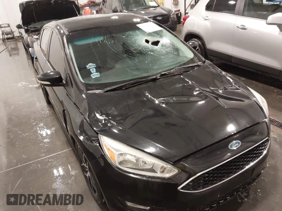 2015 Ford Focus SE с VIN 1FADP3F27FL357180, выставлен на аукционе IAAI как лот 41906601 с пробегом 70 998 миль миль и . История ставок и продаж доступна на DreamBid. Изображение 6.