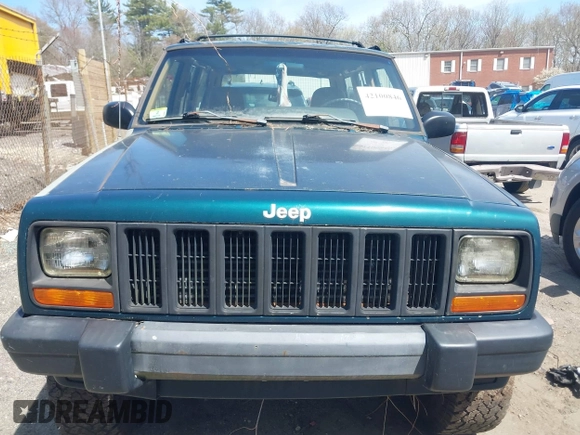 1998 Jeep Cherokee Sport with VIN 1J4FJ68S6WL151698, listed as a IAAI auction lot 42100846 with 239,466 mi miles. Bid and sale history available at carsss.com. Image 6.