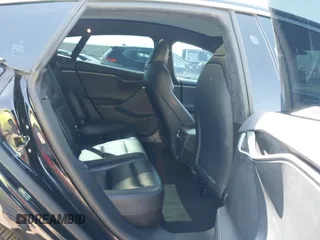 2021 Tesla Model S Long Range Plus with VIN 5YJSA1E28MF426080, listed as a IAAI auction lot 41979326 with 125,328 mi miles and . Bid and sale history available at DreamBid. Image 8.