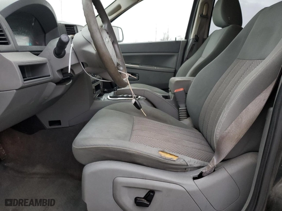 2005 Jeep Grand Cherokee Laredo with VIN 1J4HS48N05C505136, listed as a Copart auction lot 80583084 with 326,881 mi miles and Salvage Title. Bid and sale history available at carsss.com. Image 7.