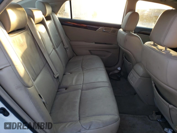 2009 Toyota Avalon XL with VIN 4T1BK36B19U339669, listed as a Copart auction lot 48547195 with 243,217 mi miles and Salvage Title. Bid and sale history available at carsss.com. Image 10.
