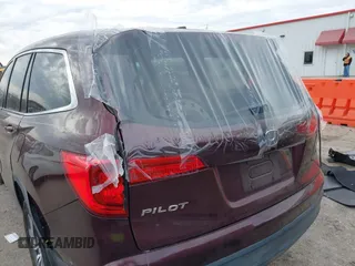 2016 Honda Pilot EX-L with VIN 5FNYF5H58GB026209, listed as a IAAI auction lot 41333088 with 129,484 mi miles and . Bid and sale history available at DreamBid. Image 6.