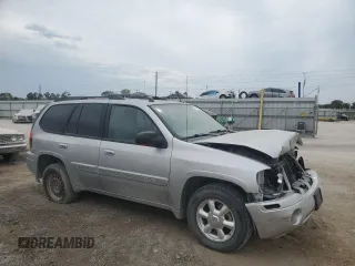 2005 GMC Envoy SLT with VIN 1GKDT13S852330514, listed as a Copart auction lot 71190504 with 203,616 mi miles and Salvage Title. Bid and sale history available at carsss.com. Image 4.