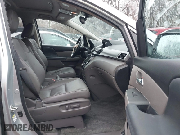 2015 Honda Odyssey EX-L with VIN 5FNRL5H63FB049952, listed as a IAAI auction lot 41467506 with 84,173 mi miles and . Bid and sale history available at carsss.com. Image 5.