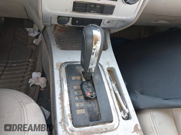 2008 Mercury Mariner with VIN 4M2CU81198KJ06044, listed as a IAAI auction lot 42466023 with 165,545 mi miles and . Bid and sale history available at DreamBid. Image 11.