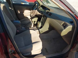 2001 Toyota Camry CE with VIN JT2BG22K710602080, listed as a IAAI auction lot 41858573 with 169,774 mi miles and . Bid and sale history available at carsss.com. Image 5.
